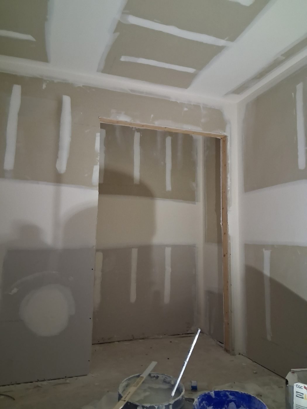 Bedroom walls and ceiling taped and sanded to a paint-ready finish